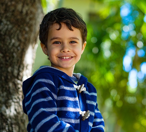 Little boy smiling after children's dentistry visit