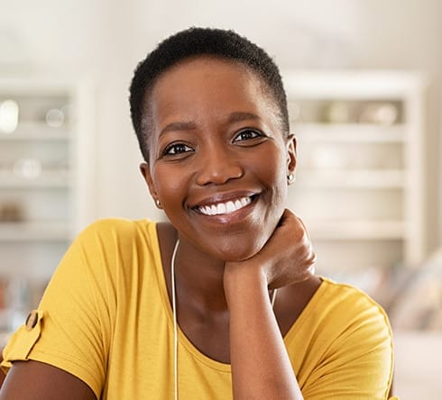 Woman with fixed denture smiling