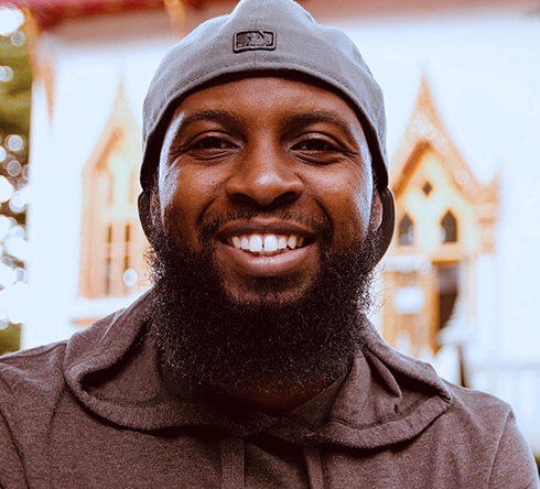 Man sharing healthy smile after tooth extraction