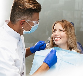 implant dentist in Fort Valley talking to a patient