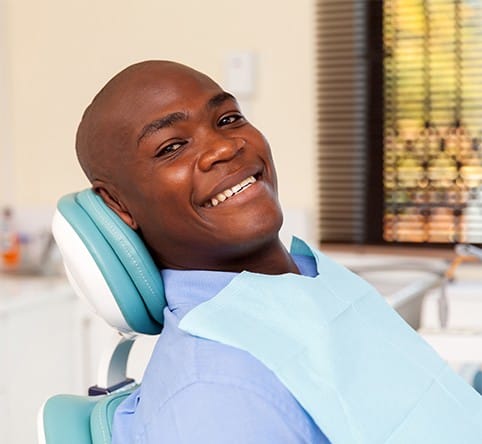 Man smiling during preventive dentistry visit