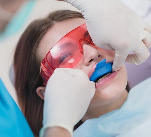 Patient receiving fluoride treatment