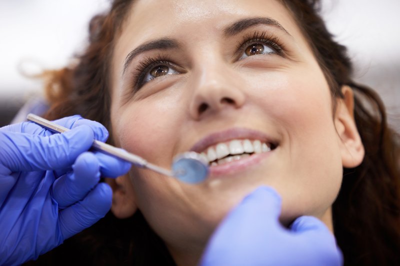 woman smiling during dental checkup