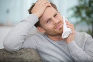 Man with a severe toothache